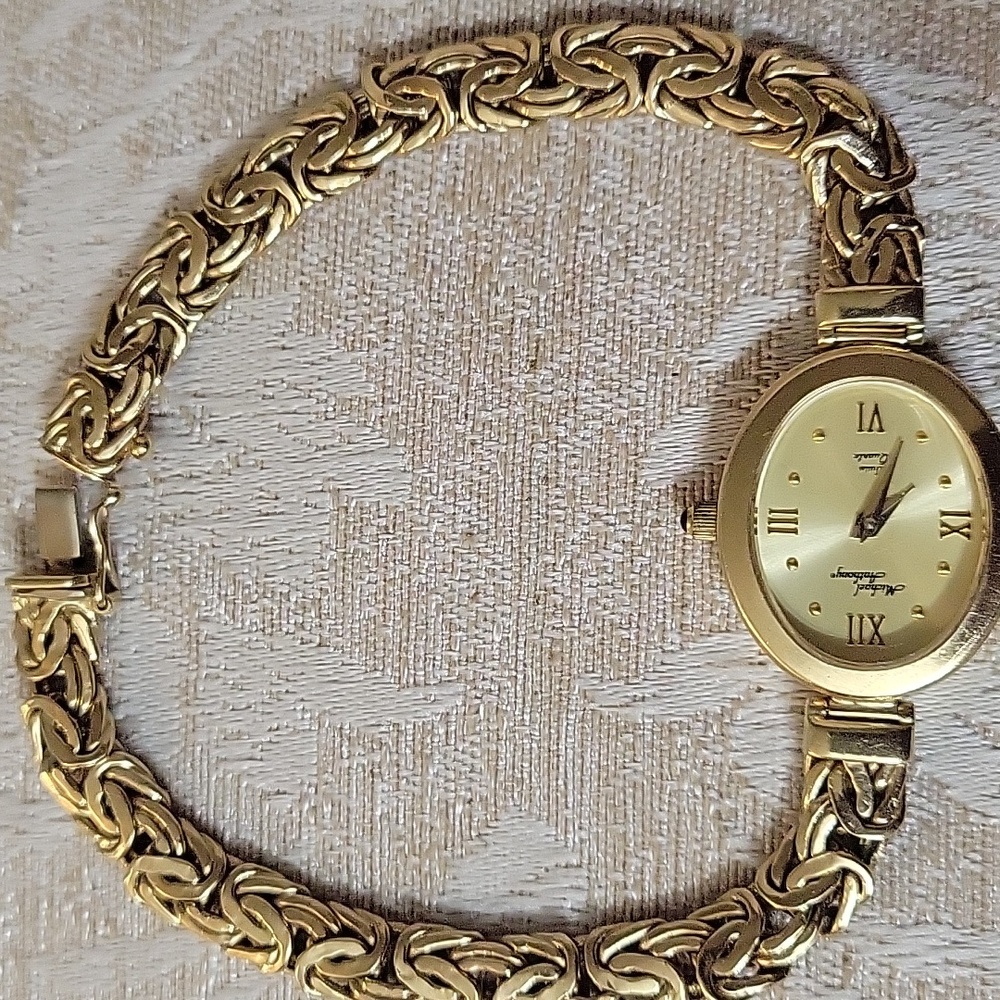 MICHEAL ANTHONY 14K Yellow Gold Oval Quartz Byzantine Band Ladies Watch